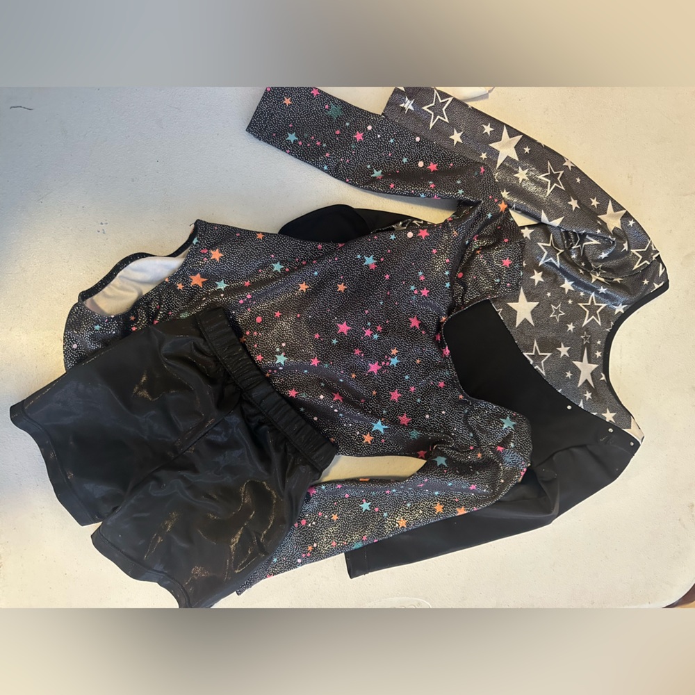Pair of 3t leotards and 1 pair of shorts lightly used